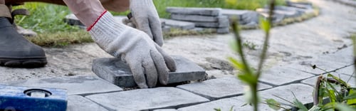 Preview: Laying paving stones on cement mortar. Laying a garden path made of tiles. Self-laying of concrete