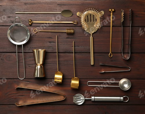 Preview: Set of modern cooking utensils on brown wooden table, flat lay