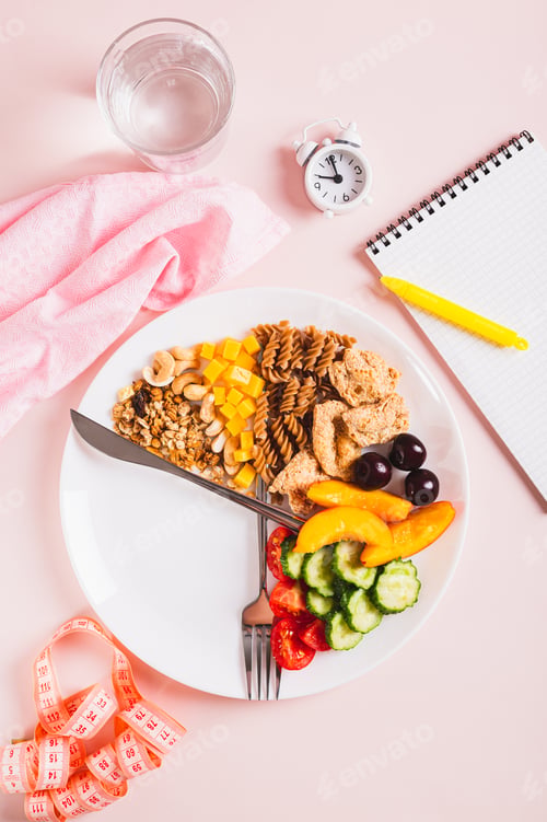 Preview: Set of healthy food for individual meal plan on plate on table top and vertical view