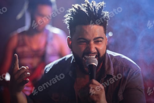 Preview: Young singer performing on stage at nightclub