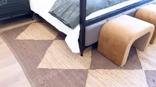 Preview: Modern Bedroom Detail Showcasing Geometric Rug and Contemporary Furniture