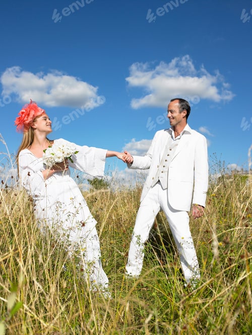 Preview: Married couple in a field