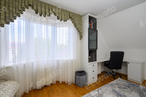Preview: Interior of a large brightly lit comfortable bedroom with domestic workplace