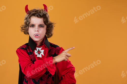 Preview: Little demon pointing aside at copyspace