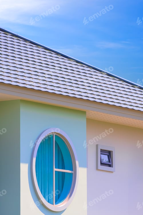 Preview: Circle glass window and small fixing glass window with ceramic tile roof of modern pastel house