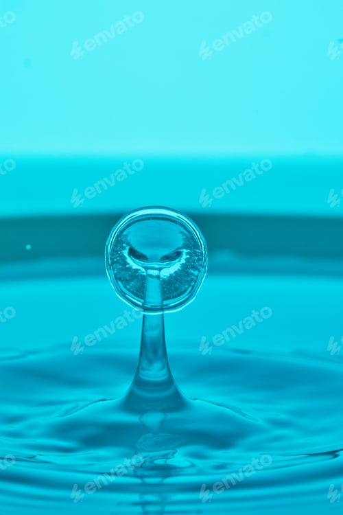 Preview: Abstract background of splash of color water, collision of colored drops, the concept