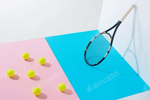 Preview: yellow tennis balls on pink paper and tennis racket on blue at white wall