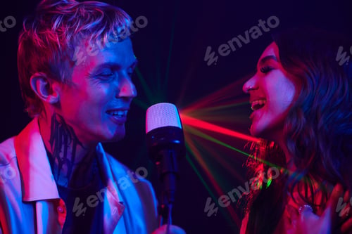 Preview: Couple Enjoying Singing in Karaoke