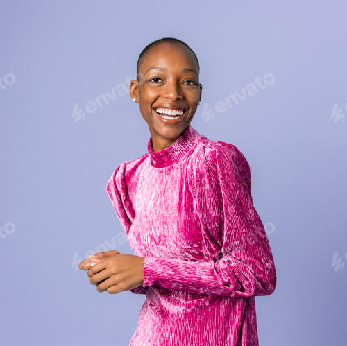 Preview: Happy black woman in a pink dress
