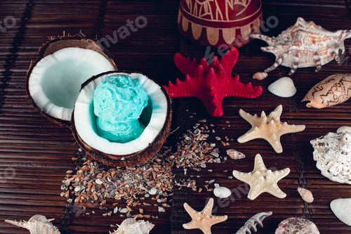 Preview: Blue ice cream in coconut bowl.