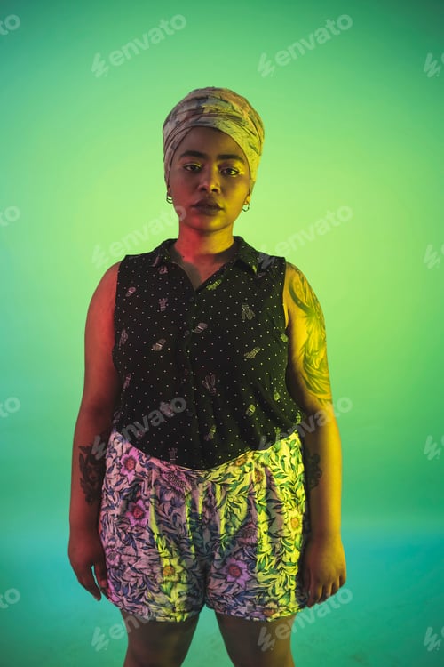 Preview: Portrait of a confident woman against a vibrant twotone background