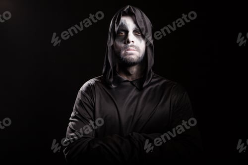 Preview: Thoughtful grim reaper over black background