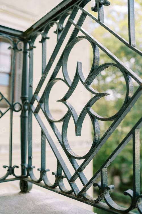 Preview: Ancient wrought iron fence of a villa terrace
