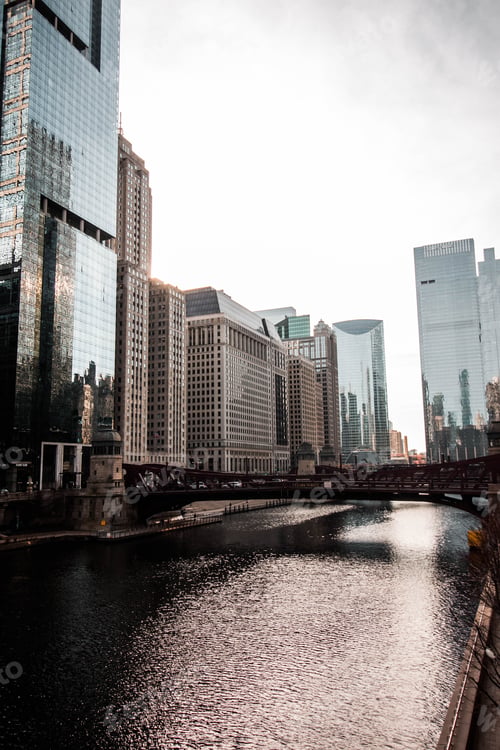 Preview: Urban waterway surrounded by tall buildings and skyscrapers