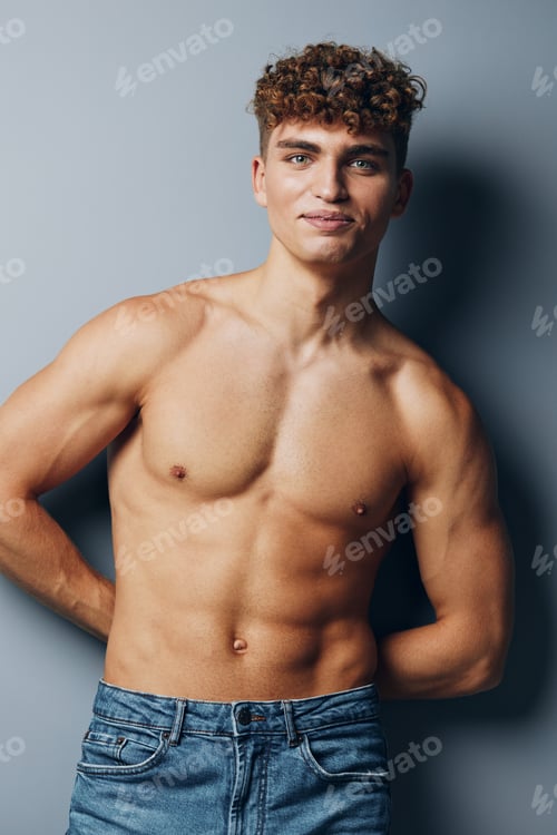Preview: man young strong bicep standing sport care guy abs shirtless gray background muscular body