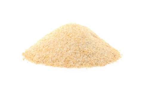 Preview: Pile of dry garlic powder on white background