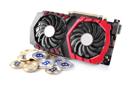Preview: Modern video card and bitcoins isolated on white