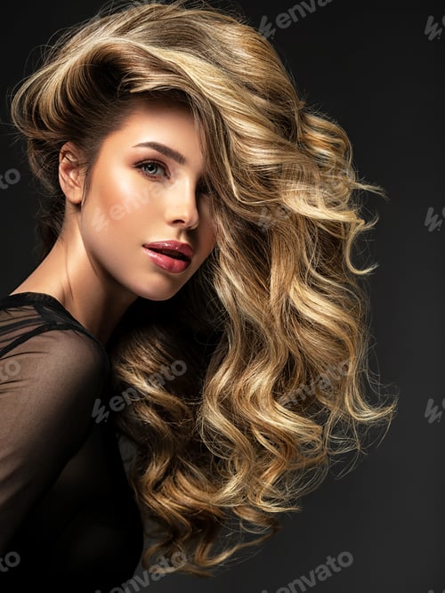 Preview: Portrait of a beautiful woman with a long hair. Pretty blonde girl with curly hairstyle.