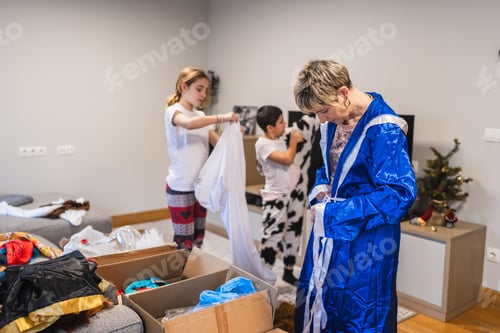 Preview: Family dressing up in carnival costumes at home
