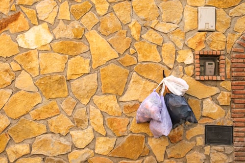 Preview: Garbage bags hanging on the doors of rural houses in villages in the Priorat of Tarragona.