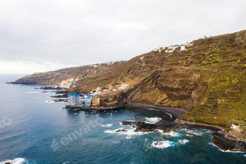 Preview: Rough rocky cliffs in the North of Tenerife.Black beach in the Canary Islands. Rocks, volcanic rocks