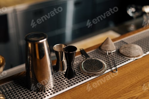 Preview: cocktail utensils jigger cocktail mixer strainer shaker on bar concept of alcoholic beverages