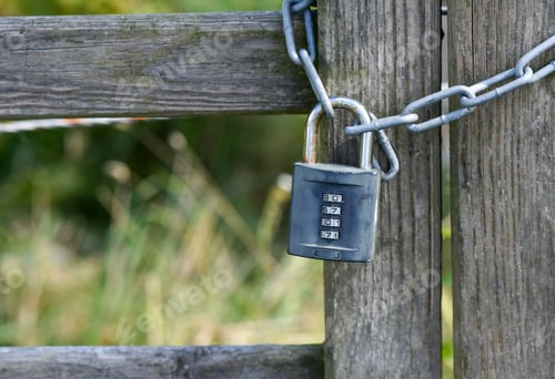Preview: A lock on a wooden fence