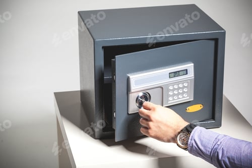 Preview: hand opened a safe, close up
