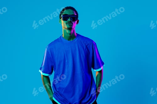 Preview: African man portrait in studio on colorful background