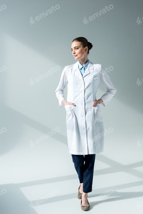 Preview: Confident Woman Doctor in Lab Coat Posing