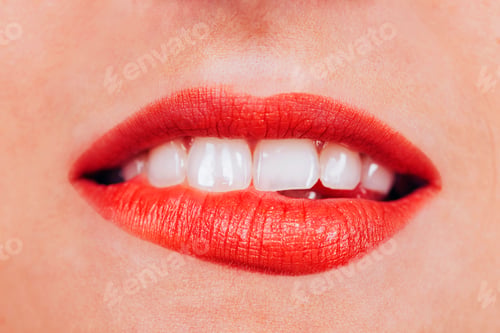 Preview: Female biting red lips