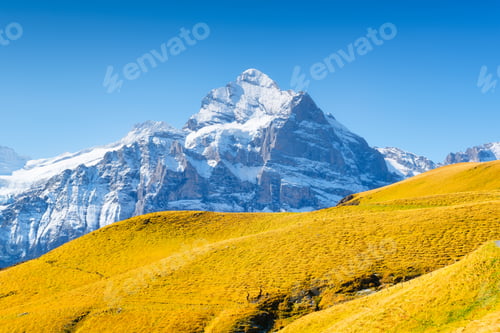 Preview: Mountains peaks. Natural landscape. Mountain range and clear blue sky.