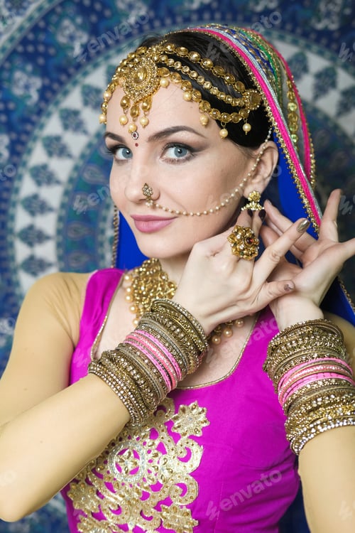 Preview: Woman In Indian Clothes Dancing Belly Dance. Young Beautiful Woman In National Costume Dancing