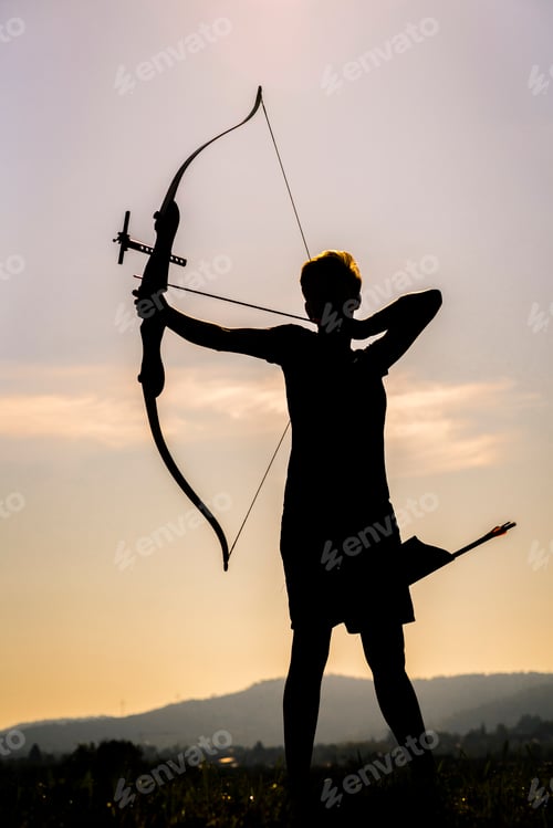 Preview: Silhouette of an archeress at twilight