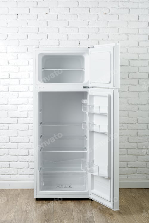 Preview: White Refrigerator Open Against Brick Wall