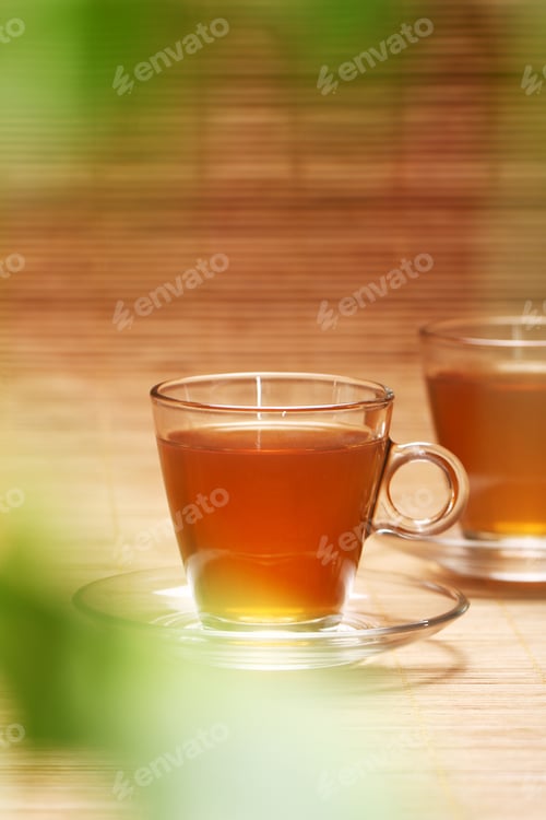 Two Cups of Tea on Bamboo Mat