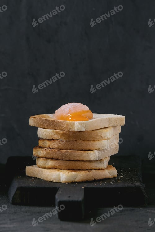 Preview: Toasts with yolk over black