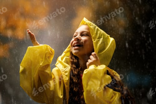 Preview: girl in the rain on an autumn walk