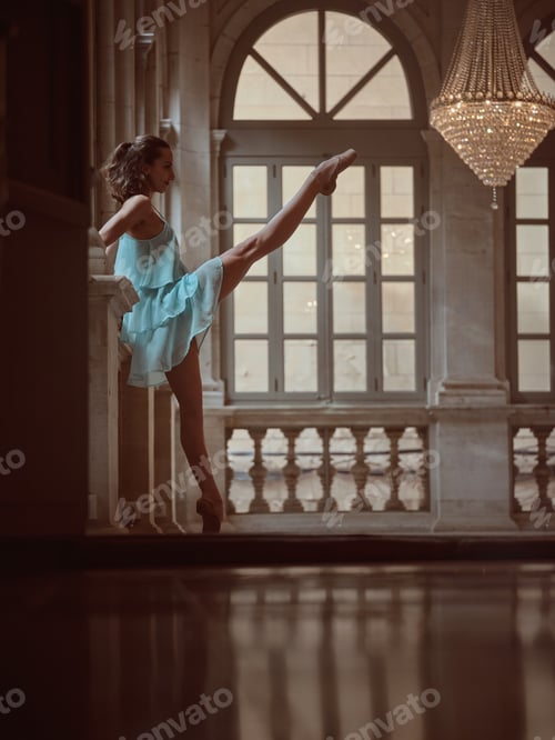 Preview: Graceful woman in pointe raising leg in cathedral