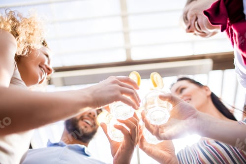 Preview: Friends Enjoying Cocktails at Party