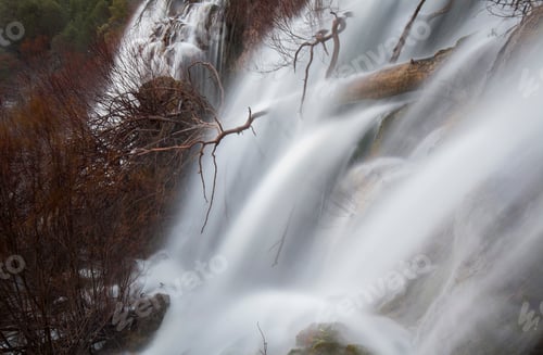 Preview: Wonderful waterfall near tree