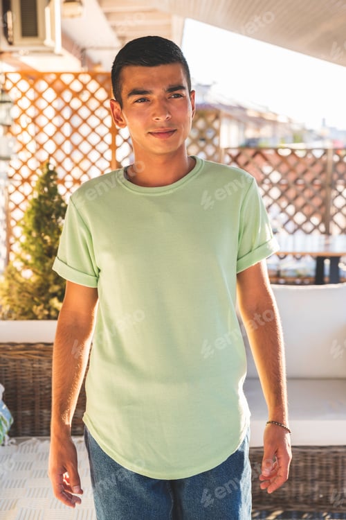 Preview: Placeit - Modern Stylish Young Guy Posing on Apartment Balcony