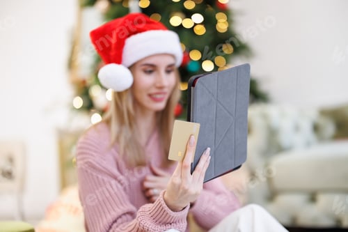 Preview: Woman Shopping Online for Christmas Gifts