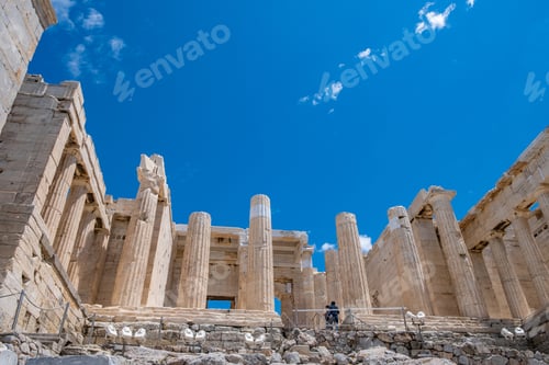 Preview: Athens, Greece. Propylaea in the Acropolis, monumental gate, blue cloudy sky in spring sunny day.