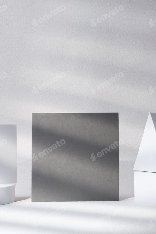 Preview: blank grey poster card with product display stand with sunlight in white studio