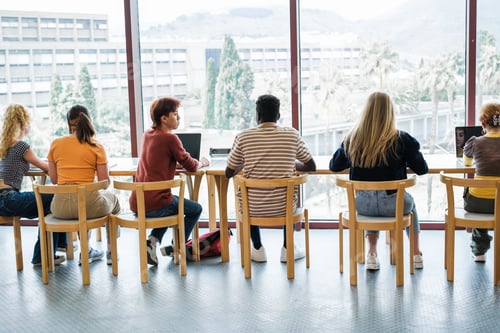 Preview: College students studying at the university together as a team