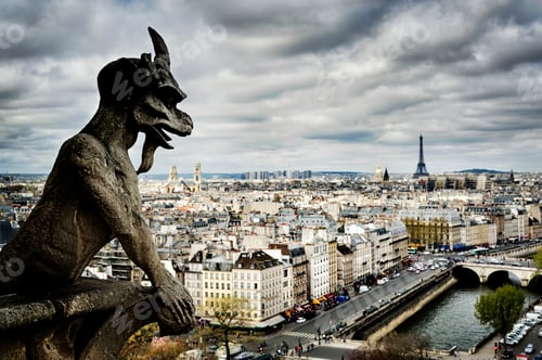 Preview: Gargoyle sculpture over Paris cityscape, Ile-de-France, France