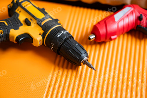 Preview: Hand Tools on an Orange Surface
