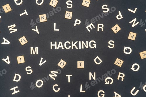 Preview: HACKING word written on dark paper background. HACKING text for your concepts