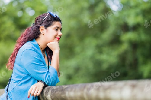 Preview: thinking outside in nature wellness self care relaxation. south american woman in senda del oso